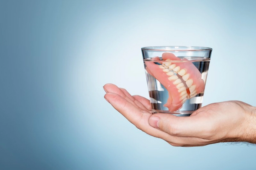does the zinc in denture adhesive change your taste buds