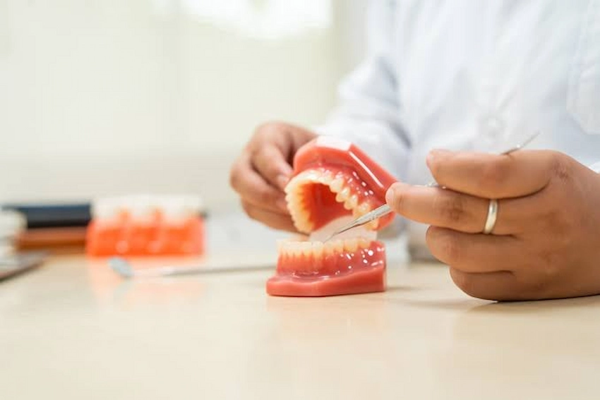 what to do with denture adhesive poisoning symptoms