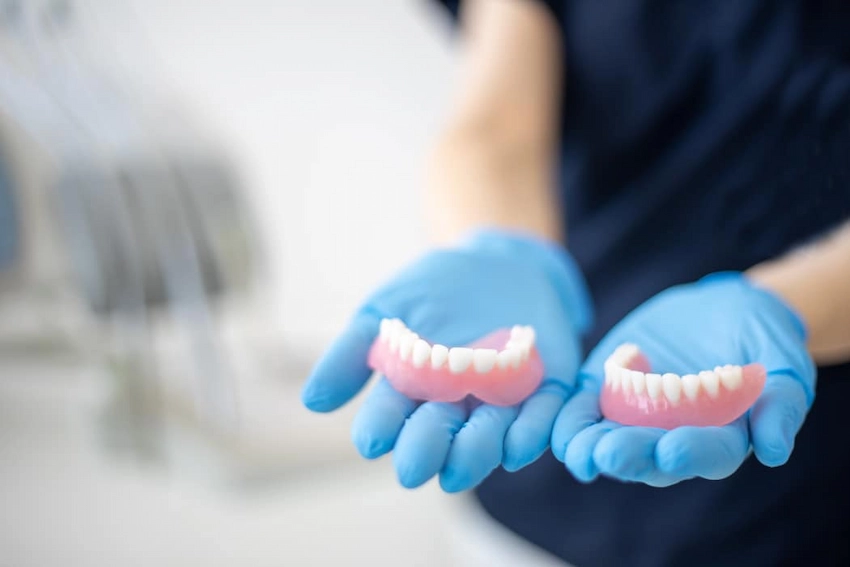 is denture adhesive causing yellowing on your palate