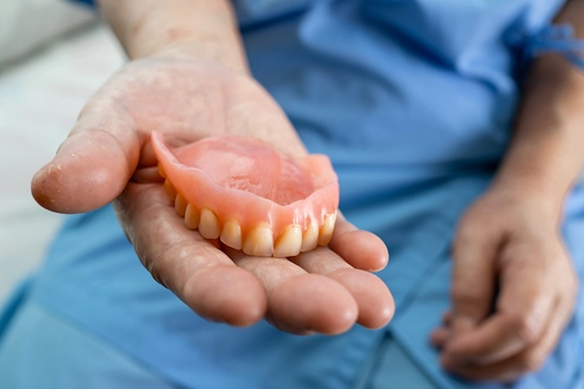 can denture adhesive cause digestive problems