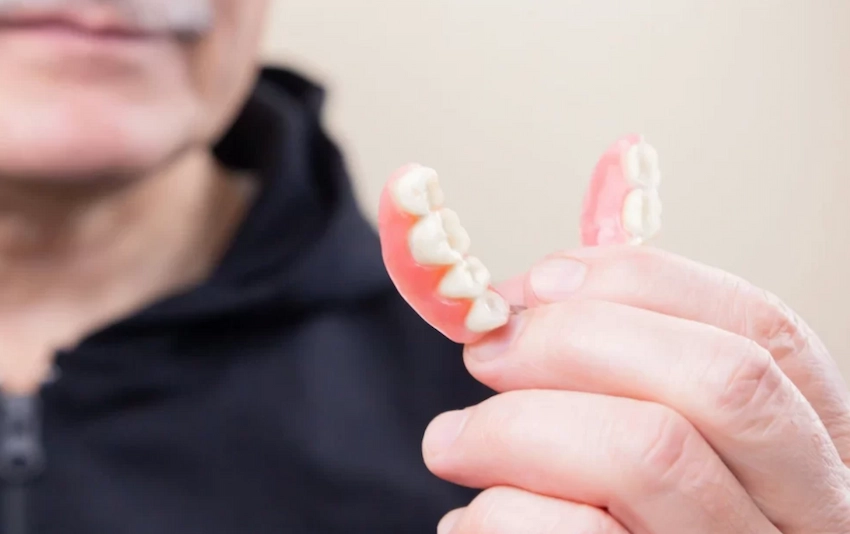 is denture adhesive necessary the clinical truth