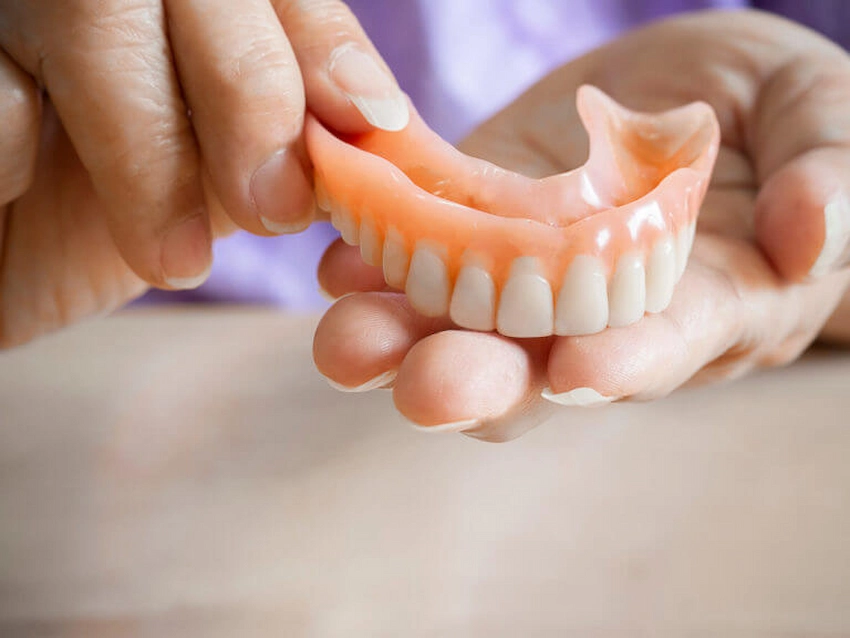 how to remove denture adhesive
