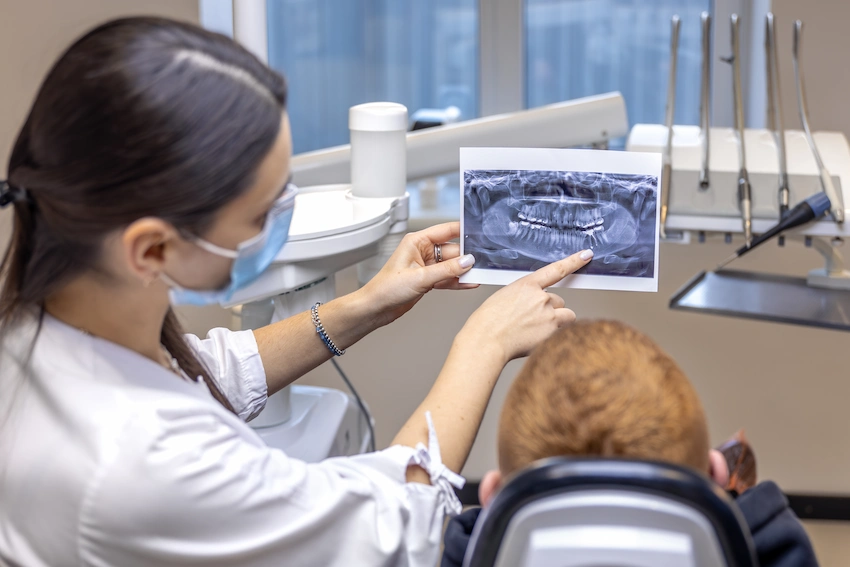dentist explaining x ray to patient