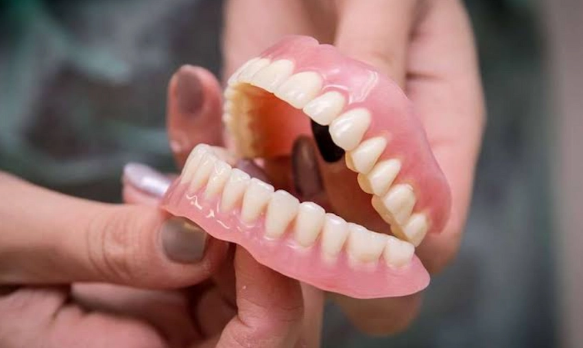the truth about denture adhesives how much is too much