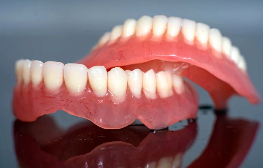 can you use denture adhesive with a soft reline
