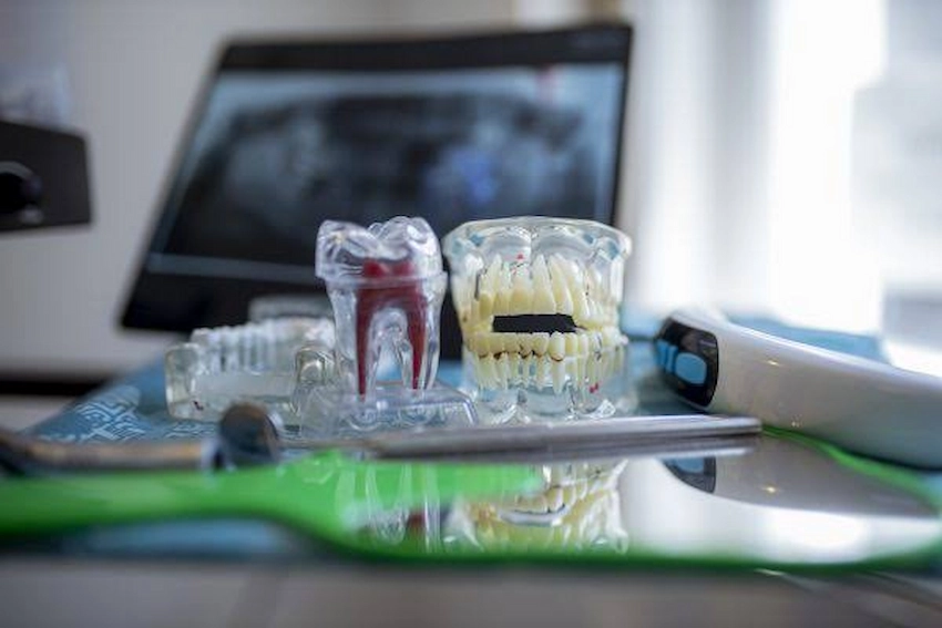 can i use denture adhesive more than once a day